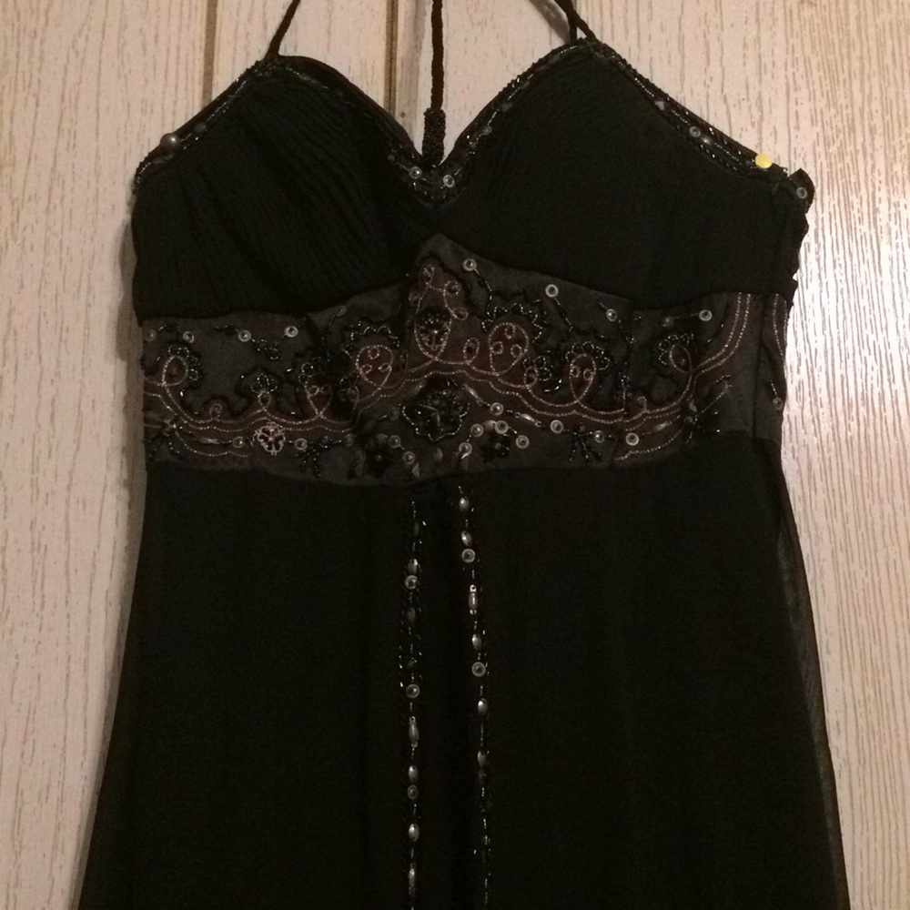 Beautifully beaded black Chicas dress